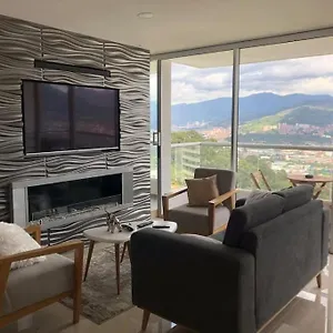 Con Vista A *